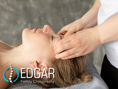 Massage Therapy on a clients head.